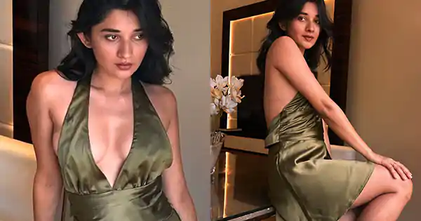 kanika mann backless satin green dress cleavage