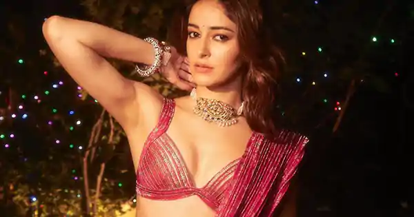 Hot! Ananya Panday in maroon saree with tiny blouse.