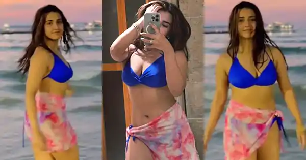 Roshni Walia in blue bikini enjoying some beach time – see pics and videos.