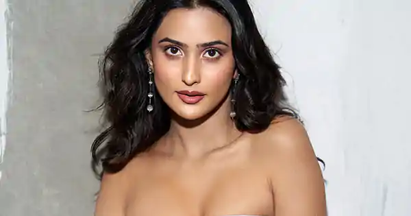 Sanchi Rai in tube top and mini skirt raises the temperature.