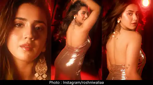 Roshni Walia in golden bodycon dress looked too hot to handle – watch video.